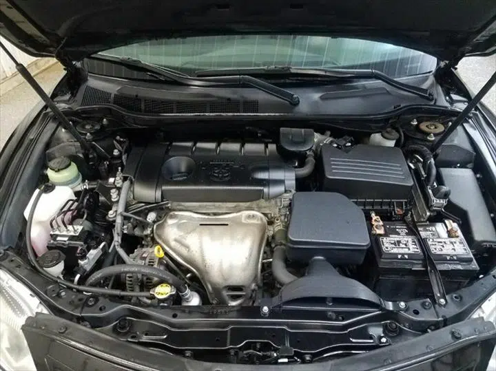 Clean engine bay of a sedan with hood open — Sharp Image Auto Detail, L.L.C. in Brodhead