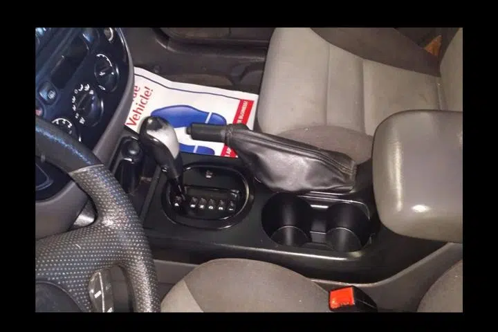 Detailed car interior console with clean shifter and cup holders — Sharp Image Auto Detail, L.L.C. in Brodhead